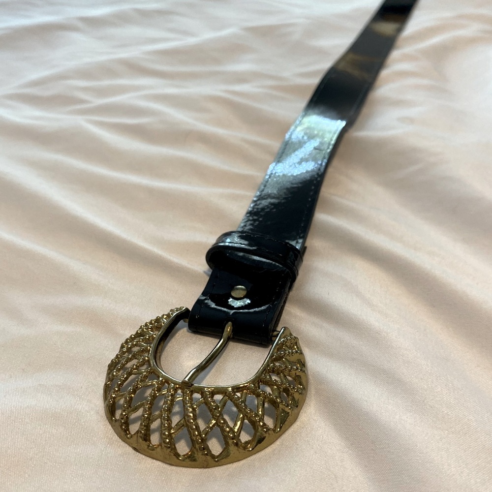 Vintage patent leather belt with decorative gold buckle
